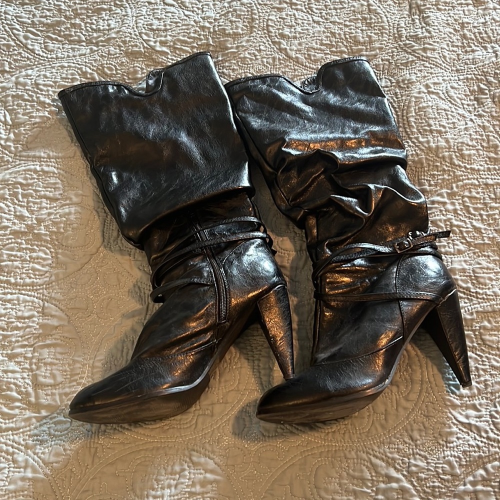 Below the knee, black faux leather boots. Size 10